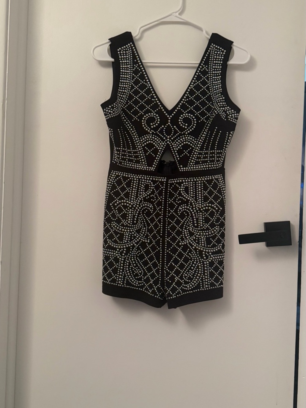Black Studded V-Neck romper (shorts) with back zipper.